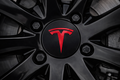 Tesla Wheel Center Caps – Black with Red Logo (4-Pack) 57MM